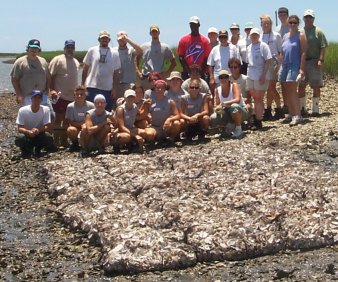 Volunteers with completed reef